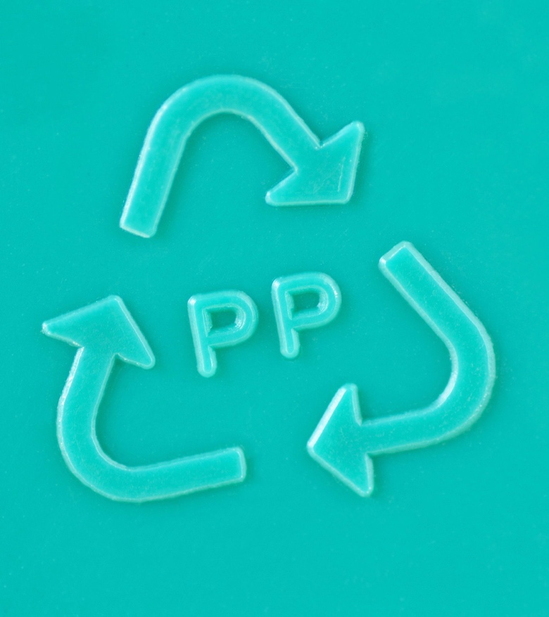 Polypropylene with a PP and three arrows recyclable symbol in aqua color